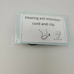 Hearing aid retention cord and clip